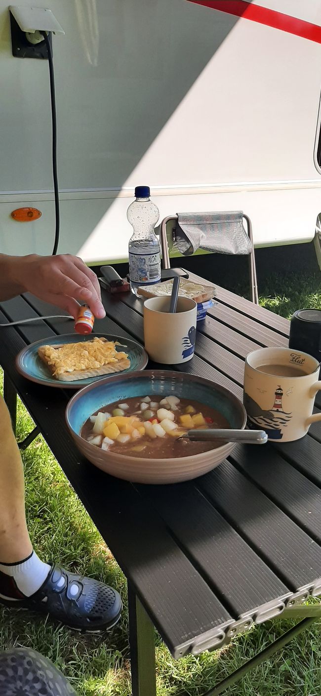 Toast, scrambled eggs, porridge, and coffee