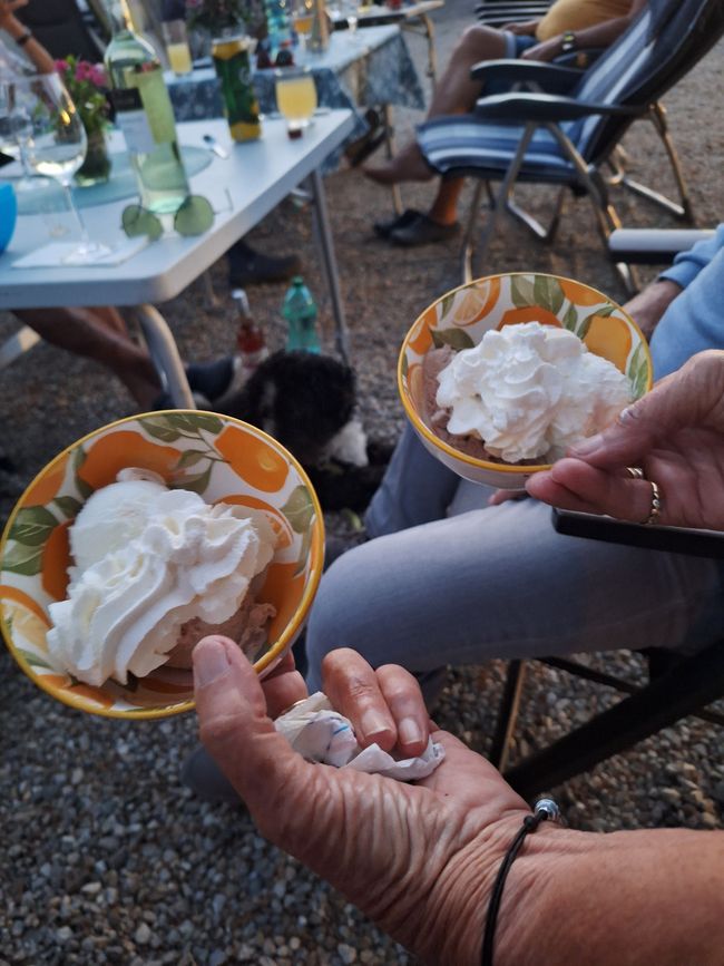 Vanilla and nut ice cream with whipped cream 