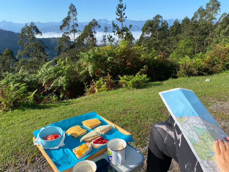 Breakfast and hiking planning above the clouds