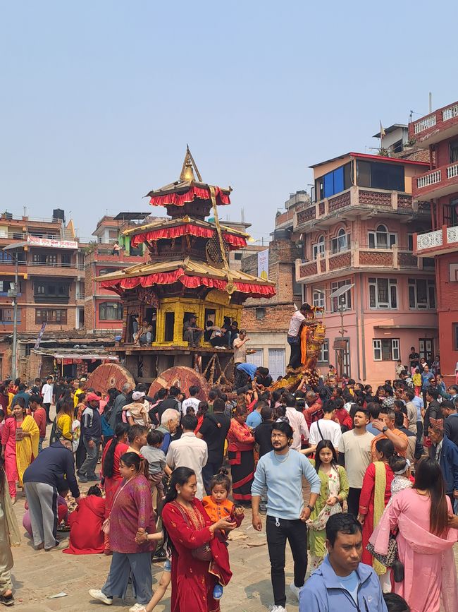 People circle around the Bhairab Temple.