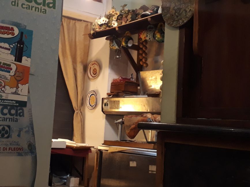 A small trattoria in the Trevi marketplace, with only 8 seats, but very good food.