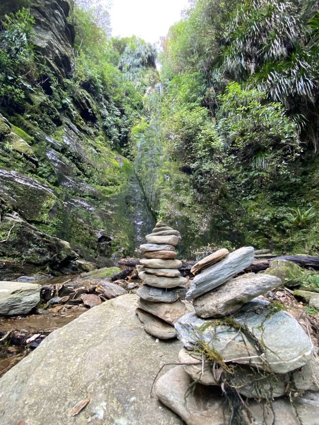 Stacked rocks at the waterfall