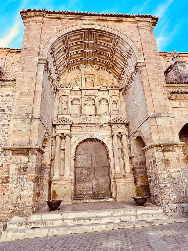 Its main entrance is shaded by a magnificent portal.
