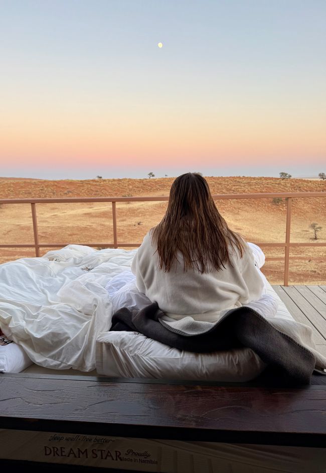</p><p>It would be beyond the scope of this article to report on everything. That's why I'll only explain the most exciting things in more detail. </p><p>During the first week, I got to know the community and the people there. I went to the hairdresser and often had a sundowner in the evening. That's what Africans call a relaxed end to the day with a delicious drink. 🍹 It's really popular there. Then I went to a farmers' market and a birthday party. And after three days, we picked up a couple from my parents' home church from the airport. They arrived at almost the same time as me. </p><p>The sunsets are unique and so much more intense than in Germany. 🌅 The air is very dry, which gave me a few nosebleeds. You can't just drink water from the tap either. I made that mistake on the first day because I didn't know. It tastes way too calcareous. 🤢 The temperatures themselves were okay. It's spring there right now.🌷It only gets a little cooler in the evenings. 30 degrees in Namibia doesn't feel that hot because of the dry air. </p><p>On September 4, we began our little tour of the country. Our first stop was at the Omaruru Game Lodge. It's a lodge with a game reserve and the opportunity to go on safari. That's what we did. My first African safari was in Namibia. 🐘I was particularly impressed by the elephants as they ran towards us because they knew the tour guides had brought food. There was so much to discover and it was just as I had imagined it would be. For example, seeing giraffes at the waterhole or zebras grazing together. I can 💯 recommend this lodge. The food was also very good. 😍</p><p>The next morning, I made myself a cup of tea and opened my Bible. There's no better way to start the day. I had a nice encounter with a peacock. 🦚 The time there was much too short, but we had a tight schedule. We wanted to continue on to Swakopmund on the coast. On the way there, we stopped at a mountain winery. 🥃🍷 </p><p>In Swakopmund, I started to feel cold. A real drop in temperature of 10 degrees on the coast awaited us. There, I went on a desert tour with the couple from my parents' home church to see the “Little Five.” These include the Namaqua chameleon, the palmato gecko, the shovel-snouted lizard, the sidewinder snake, and the dancing white lady (a spider). We saw some of them. Click through the gallery to see them. 😉</p><p>Another experience that stuck with me was visiting the baby hatch. It was shocking to see how many babies are simply abandoned. While we were there, a little boy ran up to my dad and wanted to be picked up. He just needed a few minutes of love and attention. 🥹 I was also handed a tiny, delicate three- to four-week-old baby girl. The people there told us about their work and how much they would appreciate support.</p><p>After visiting Flamingo Lagoon, where we saw lots of flamingos, and Walvis Bay, another coastal town, we continued on toward the desert after saying goodbye to the couple who had let us stay with them for three days and who were friends of my parents.</p><p>Guys, you can't imagine what it's like to be on the road for hours and not have a toilet nearby. 😬 The bumpy road we were on was my worst enemy. I started to miss German rest stops and was so happy when we saw a wooden structure with an outhouse in it somewhere in the middle of nowhere. It's not every day you get to go to the toilet with a view. 🤣 You always have to be careful... you hear stories about wild snakes biting you in the butt. I was even more delighted to find a real rest stop in Solitaire. It had real toilets, a café, a souvenir shop, and lots of old, rusty cars for atmosphere. A really beautiful area to take photos. 📸🏜️ Someone recommended the apple strudel there, which we then tried.</p><p>When we arrived at the Namib Desert Lodge, I jumped into the pool to cool off. The food was very good here too. 👍🏻 We set off early the next morning. We wanted to go to Sossusvlei to see Deadvlei, the landscape with the dead trees. On the way there, we helped three Americans who had broken down on the road. One of their tires had burst while they were driving. So we pushed the car to a straight spot so they could put on the spare tire. After a two-hour drive, mostly on bumpy roads, and a few short stops to photograph wild antelopes, climb Dune 45, and marvel at hot air balloons floating over the vastness of Africa, we had to take a shuttle to Deadvlei because our car tires couldn't handle the sandy roads. The shuttle was actually a kind of off-road vehicle with low tire pressure so it could drive on the sand. From the parking lot, we then had to walk about 20 minutes to get to the spot with the trees. 🚶🏼♀️It was quite a long way and such a popular place. Here, too, you can take excellent pictures. The trees are over 900 years old.</p><p>On our way back to the lodge, we stopped at the nearby Sessriem Canyon, where I saw a snake. It was a sidewinder snake, and no, I didn't let it bite me. 😄</p><p>The next night would probably be the coolest night of my life so far. We had booked an overnight stay at Dune Star Camp. There, you can move your bed onto your terrace and spend the night under the starry sky. In the evening, we were given a short tour and saw another little gecko peeking out of its hole. We all enjoyed a sundowner on the terrace and were treated to snacks and drinks on the house.🍸 We had dinner in the glow of the evening sun. You can see what we had in the picture gallery. Food at its finest. 🥰 The evening just kept getting better and better. Have you ever seen a starry sky in the desert? Sooo beautiful. 🤩 I tried to get the perfect photo, where you could see the camp but also the starry sky, using a long exposure time. I think the pictures turned out quite well. Here in Africa, you can also see the scorpion in the sky and the Southern Cross. The night was a bit chilly, but it was worth it. Wrapped in my bathrobe, I stayed up until the early hours of the morning. Then it got quite damp because of the dew. But that didn't stop me. In the morning, I started the day with the Word of God again, and soon there was a knock at the door. Coffee and cocoa were brought directly to my bed. And by directly, I mean directly. 😂</p><p>This night also passed far too quickly. Back at the Namib Desert Lodge, where the rest of our luggage was waiting, I checked my university website. The grades had just arrived and I was super nervous about whether I had passed everything. You may remember from media law that I had to retake this exam. And yes, I passed all my exams and can now concentrate fully on my bachelor's degree. You can't imagine what a weight was lifted off my shoulders when I knew I didn't have to retake anything. But yes, I know myself that I can be a bit of a drama queen sometimes. That reminds me of a Bible verse from Proverbs 16:3: “Commit your works to the Lord, and your plans will be established.” If we walk with God and trust in Him, He will grant us success in what we do. 📖🙏🏻 Just a quick aside about the university situation.</p><p>Un employee at the reception desk said to us, “It's a shame you didn't play the guitar. I saw your guitar and wondered when you would play.” My dad didn't need to be told twice and took out his guitar. So there we were, in the middle of nowhere at a lodge, playing Christian songs. Meanwhile, more and more employees gathered around and sang along. Others watched from further away. You have to know that Namibia is a very religious country. What a wonderful experience and what a joy it was to have the opportunity to sing about Jesus. </p><p>We continued with a visit to friends of my parents at Duwisib Castle and later at Dabis Farm, where we also spent the night. Here we were given a tour of the farm on a truck and we made “porridge.” This is basically just barbecuing, but instead of pork or turkey, we used lamb or antelope... The next morning, I even got to help milk the cows. I'll tell you, it's really harder than you'd think. . 0, 0, 0, 0, 0, 0, 0, 0, 0, 0, 0, 0, 0, 0, 0, 0, 0, 0, 0, 0, 0, 0, 0, 0, 0, 0, 0, 0, 0, 0, 0, 0, 0, 0, 0, 0, 0, 0, 0, 0, 0, 0, 0, 0, 0, 0, 0, 0, 0, 0, 0, 0, 0, 0, 0, 0, 0, 0, 0, 0, 0, 0, 0,