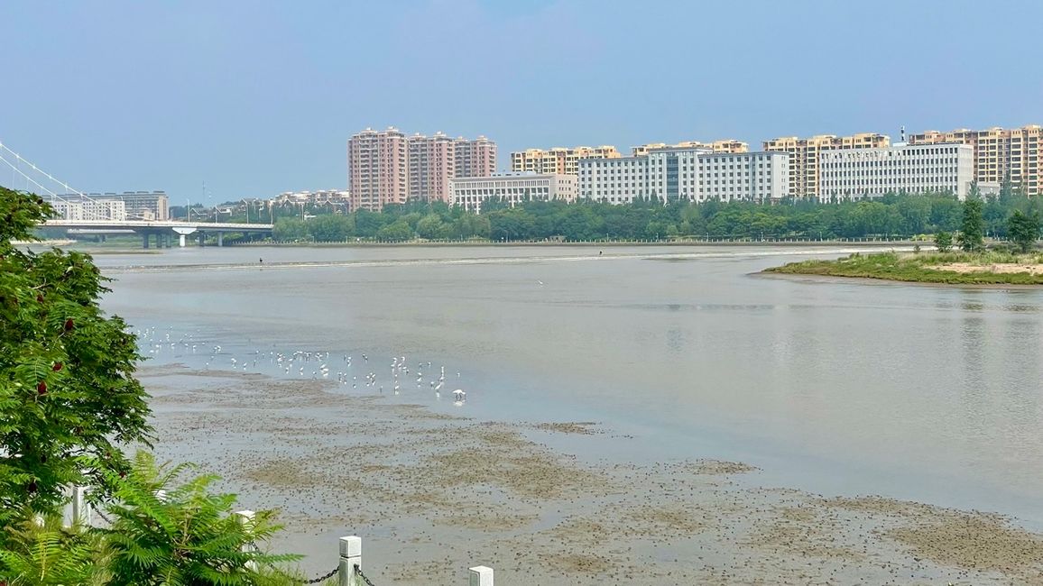 We cycle along the Xingcheng River...