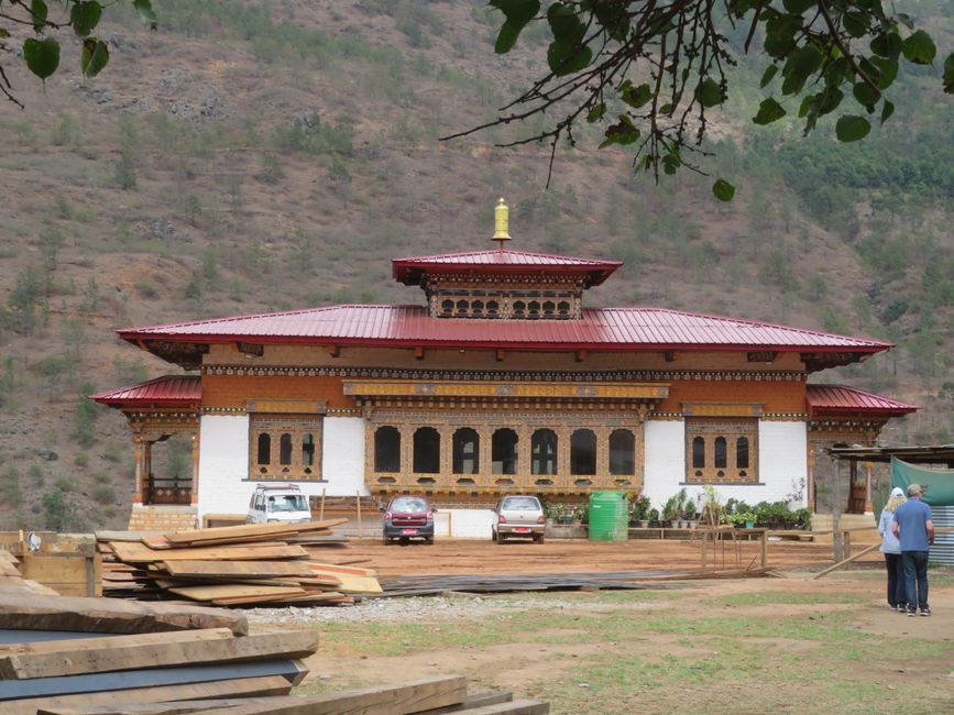 Mrs. Waas with prayer wheels
