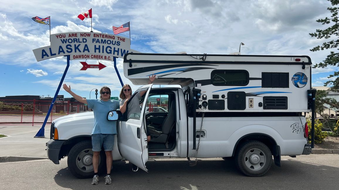 we took the obligatory picture and then set off on the first kilometers. </p><p>As you can expect wildlife sightings along the highway, the hours fly by. In every new valley and around every next curve, we look out for a bear or moose again. However, on that day, we didn't see any wildlife.</p><p>Even on the next day, it was mostly about making kilometers, as there weren't any really worthwhile stops for us in the first 500 km. Shortly after we started, we were rewarded with a doe and two black bears. After a break in Fort Nelson, we continued towards Stone Mountain Provincial Park.</p><p>First, we spotted a black bear cub right by the roadside, with no mother in sight. The little one looked very lively.</p><p>Just a few kilometers later, we had to stop again. In front of us, a herd of wild bison was roaming on the road. These animals are no joke, but fortunately, they were more interested in the juicy grass by the roadside than in us. </p><p>We saw four more black bears along the road until we reached our hike at Baba Canyon.</p><p>On the way to the campsite for the night, we crossed paths with a lone caribou. That was probably our most exciting day in terms of wildlife sightings so far.</p><p>Even though we are happy about every animal, especially bears, it reminds us that we are in their habitat. It’s no coincidence that all trash cans here are bear-proof. We also have increased our precautions. We acquired an airtight box in which we store most of our food overnight. This will be kept in the driver’s cabin at night, as our camper is made of tent fabric on the sides. Perhaps from now on, bear spray will also lie next to our pillows at night, just in case.</p><p>Since bears' noses are seven times stronger than dogs', especially odorous foods must go into the box. Even something like oatmeal and pasta smells to a bear. But we’re not getting anxious about it; we just try to minimize the risk.</p><p>In Stone Mountain Provincial Park, we took a hike to Flower Springs Lake. Although we didn’t have the best weather, the view over the high plain and the rocky mountains was still really beautiful. </p><p>We traveled on to our next campsite right by Toad River and enjoyed a quiet afternoon in the camper as the weather outside became less pleasant.</p><p>The next morning, we set off early since wildlife sightings are more likely in the morning hours. Indeed, we were rewarded with one of the rarest animals. At the roadside, a wolf was having its breakfast. We were lucky that a woman was already standing there with her hazard lights on, showing us the wolf; otherwise, we probably wouldn’t have spotted the shy creature. Unfortunately, Julian's photography skills weren't enough for a good picture. So, unfortunately, you only get a blurry photo ;-)</p><p>We drove to Muncho Lake Provincial Park, where the highway runs right along the lake. There, we hiked the Stone Sheep Trail, where you can allegedly observe the sheep of the same name particularly well. However, we didn’t see any.</p><p>We continued on, and then, indeed, a few sheep were standing by the roadside.</p><p>After a bath in Liard River Hot Springs (we know that from New Zealand), we are now sitting in a lodge with coffee. Here, after days without reception, there is wifi again, so we can now upload this blog entry to you in real time.</p><p>In the next few days, we will arrive in Yukon and slowly move towards Alaska. As soon as we have reliable reception again, we need to apply for the ESTA and take care of preparations like route, sim card, etc.</p>