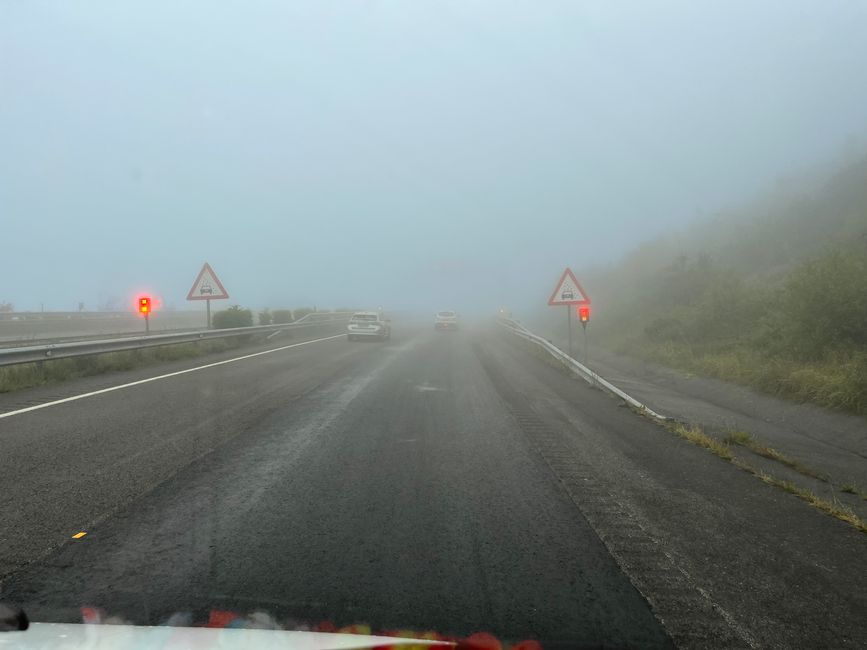 The A-8 highway from Galicia goes through the clouds - the guideposts are illuminated