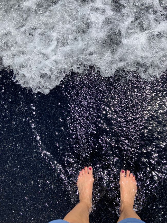 Black sand beach and crystal clear water 🌊