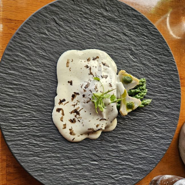 Asparagus and ravioli, truffle parmesan cream
