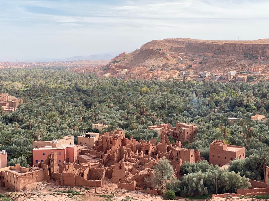 The oasis with the old, abandoned kasbah in the foreground