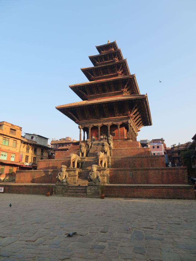 The various temples in Bhaktapur. The various figures on the steps are the protective guard of the god who lives in the respective temple. Each animal protects the deity ten times better than the animal beneath it.
