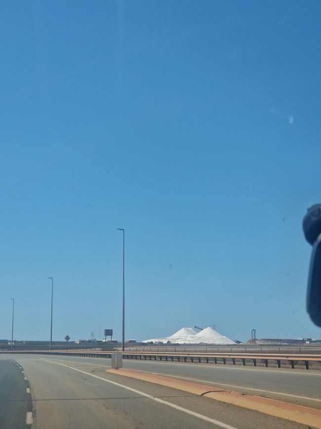 Salt mountains that look like circus tents from a distance