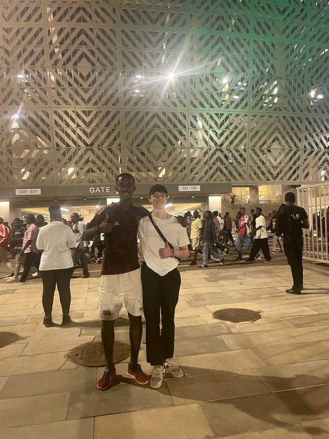 Idrissa and I in front of the Amahoro Stadium