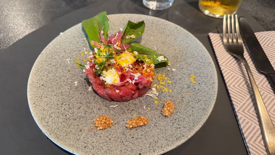Beef tartare, pickled onions, mustard caviar
