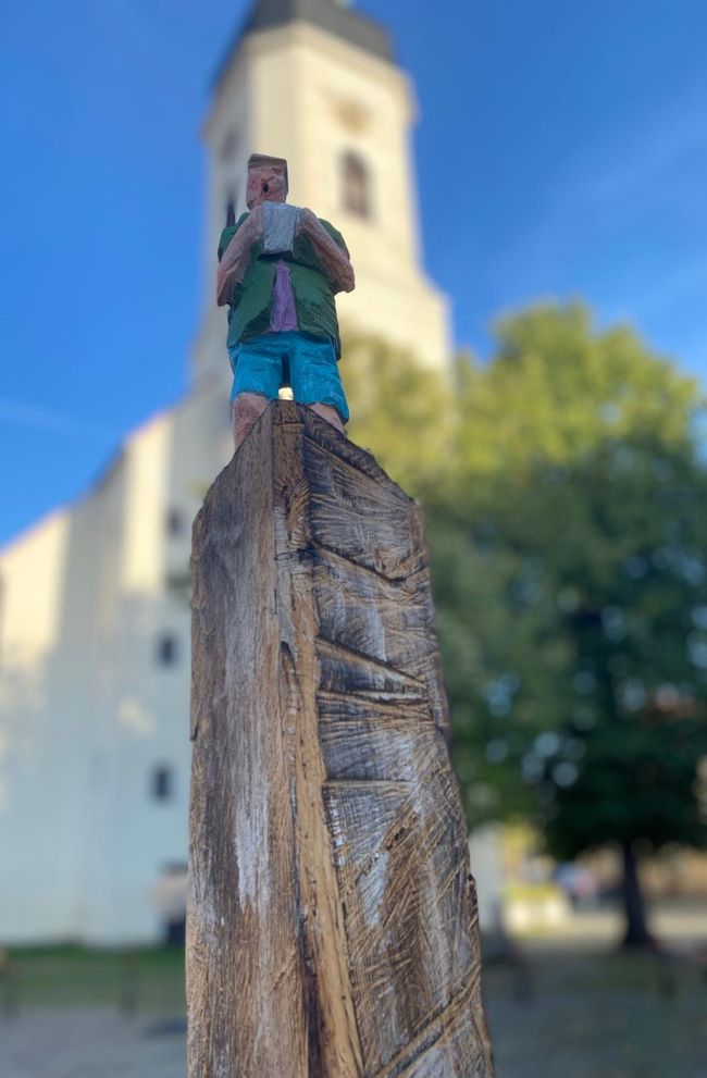 Wooden figure in the old town