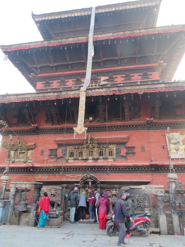 The various temples in Bhaktapur. The ribbon is said to serve as a conductor for the gods.