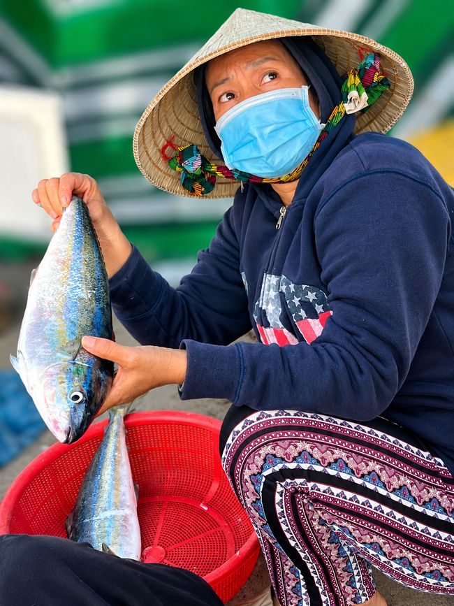 Fish vendor with fresh catch