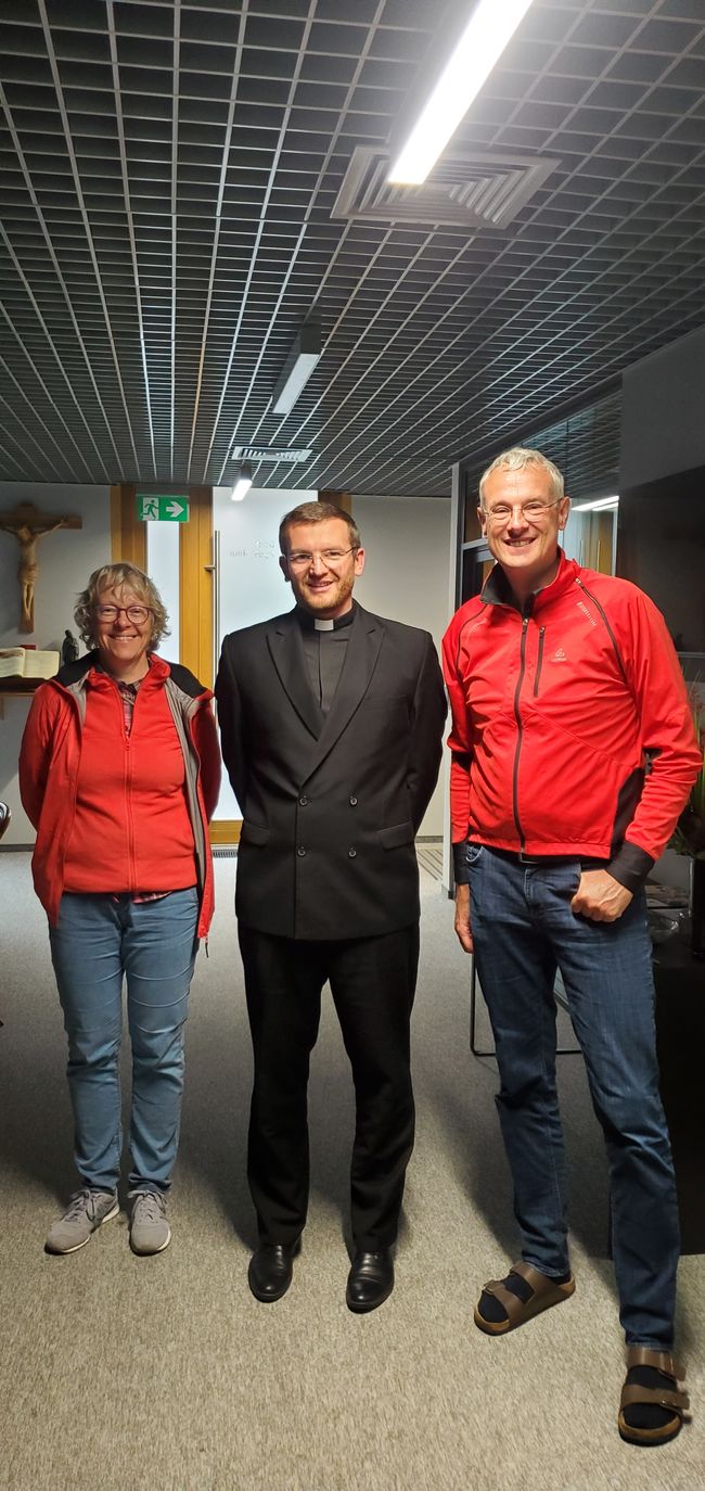Father Marcin (in the middle)
