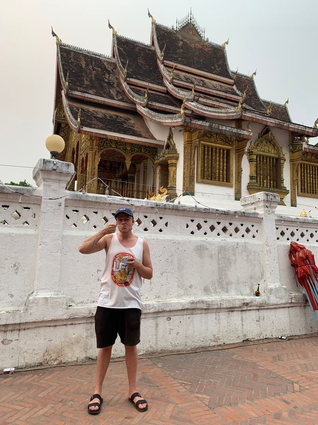 Julian with Kampot pepper ice cream in front of temple 