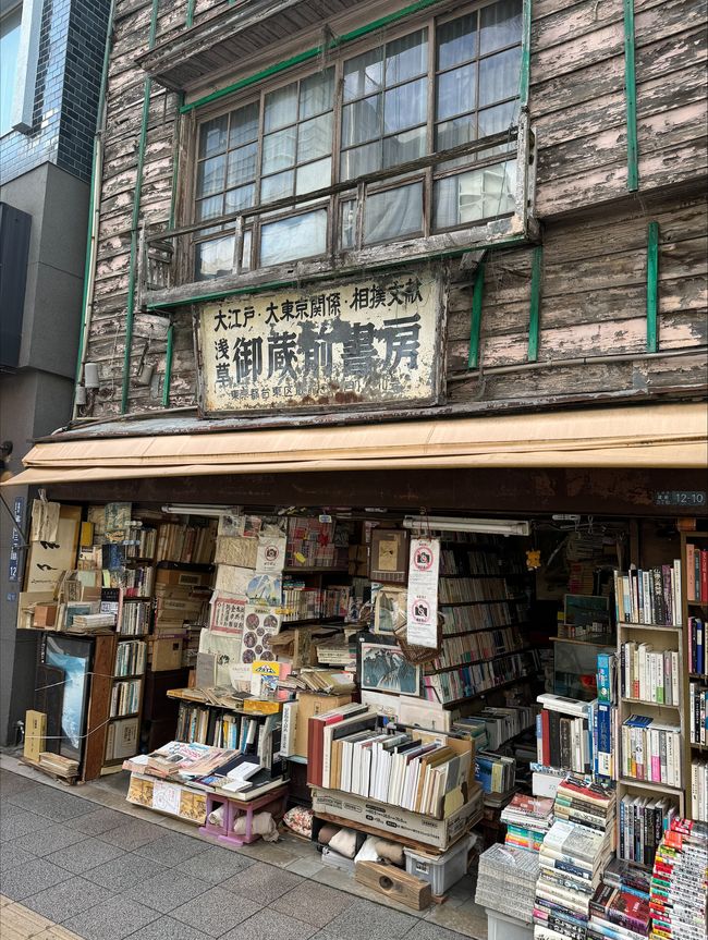 an old shop in the midst of skyscrapers...