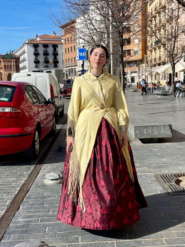 A young Spanish woman in her traditional costume.