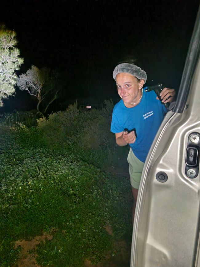 Viviane washing her face at the free campsite