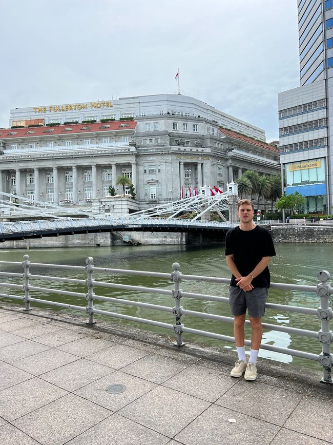 In front of the Fullerton Hotel