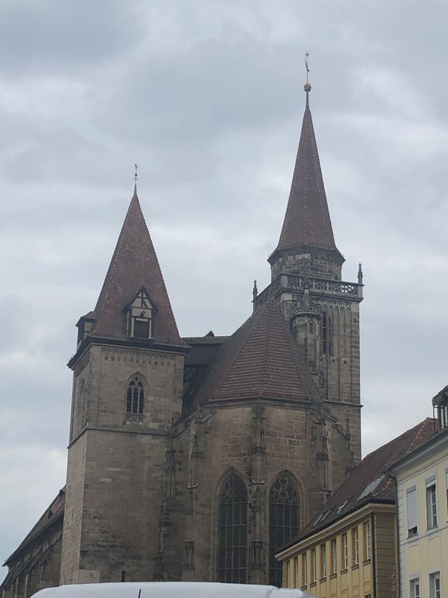 Why does this church have two different towers?