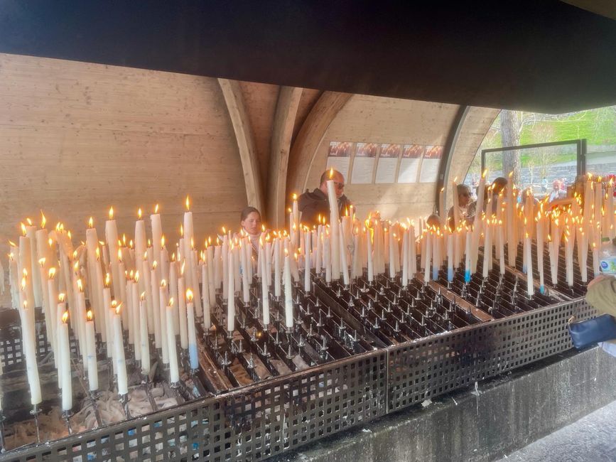 A sea of petition candles inside the cathedral.