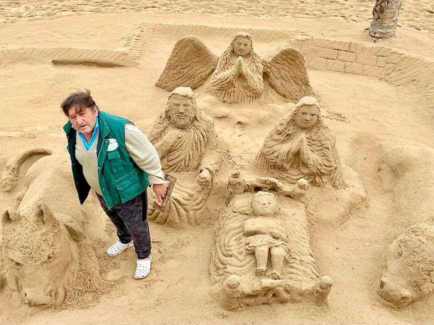 This sand artist had no idea that the rain was coming.