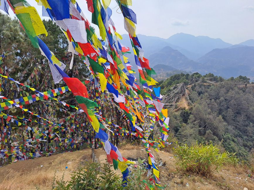 The Buddhist prayer flags going down the entire mountain.