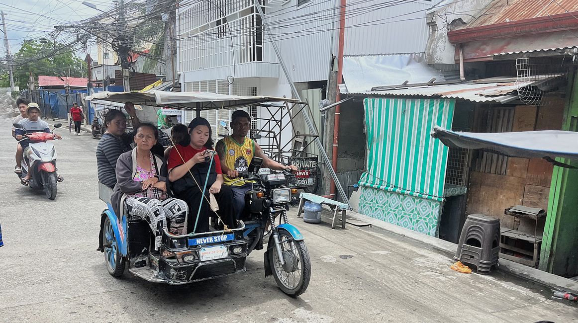 Motorradtaxi (Tricycle)