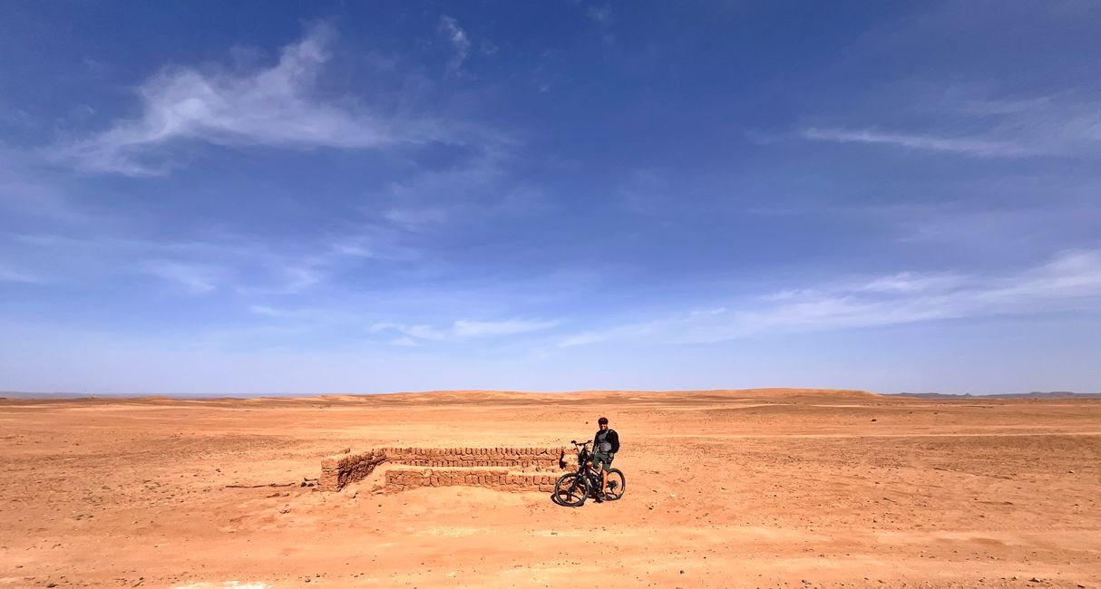 Biking in the desert just before we got stuck in the soft sand