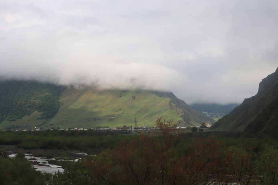 Fog envelops the high mountains