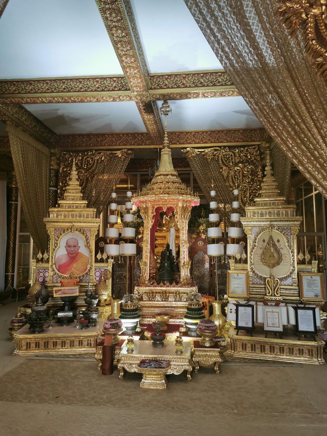 ... with golden Buddha statues...