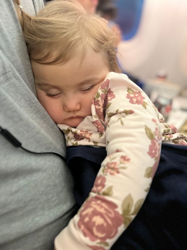 Little baby sleeping, the whole flight.