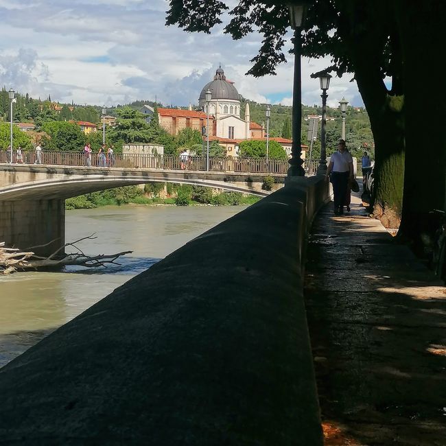 View of the Parrocchia di San Giorgio in Braida from the Adige