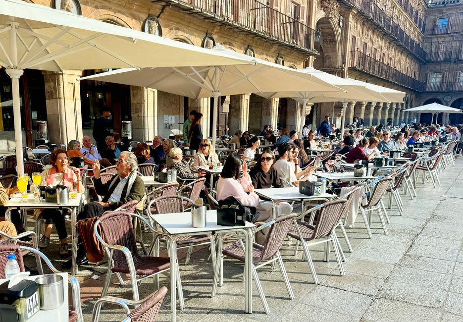 The cafés lining the square are always well frequented.